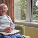 Jane Richards, reading her father's sermon. 