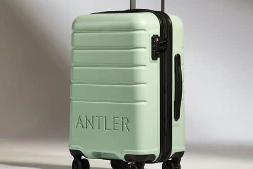 Antler hard shell expandable cabin suitcase in aspen green with logo design