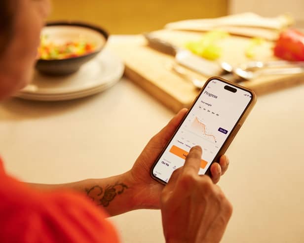 Tracking weight loss progress using the Voy app, part of a behaviour-led programme supporting Wegovy and Mounjaro users.