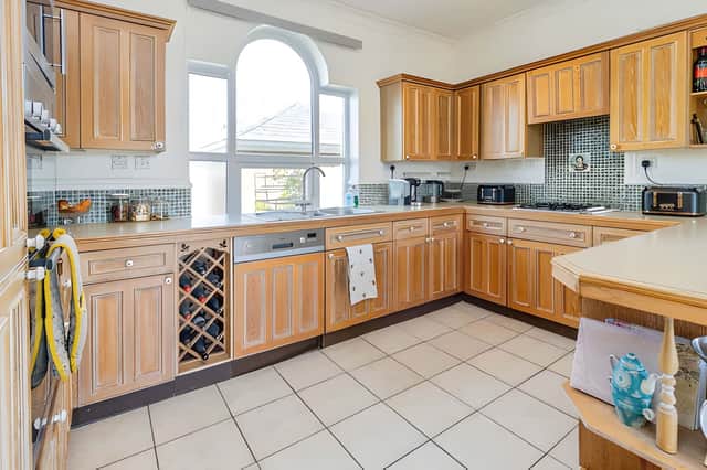 The spacious kitchen and dining area forms one of the home's main family spaces
