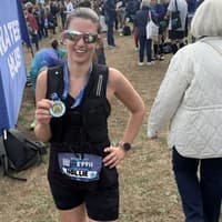 Patients cheer on Thame audiologist as she runs Oxford Half Marathon for dementia charity