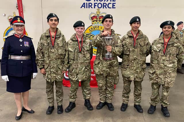 HM Lord-Lieutenant of Buckinghamshire, The Lady Howe, with the winning team, RGS High Wycombe CCF.