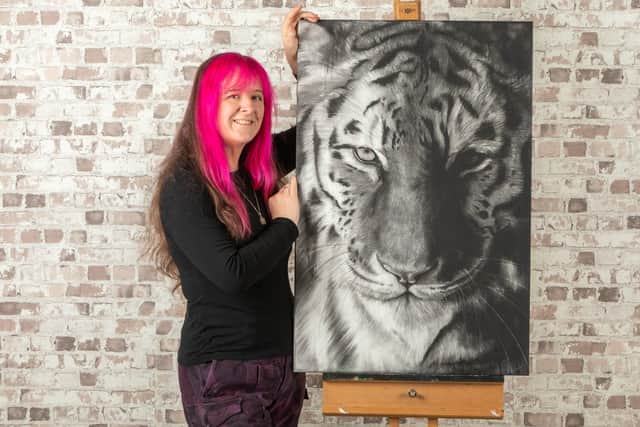 Becky with "Tyger, Tyger", another drawing featured in the book.