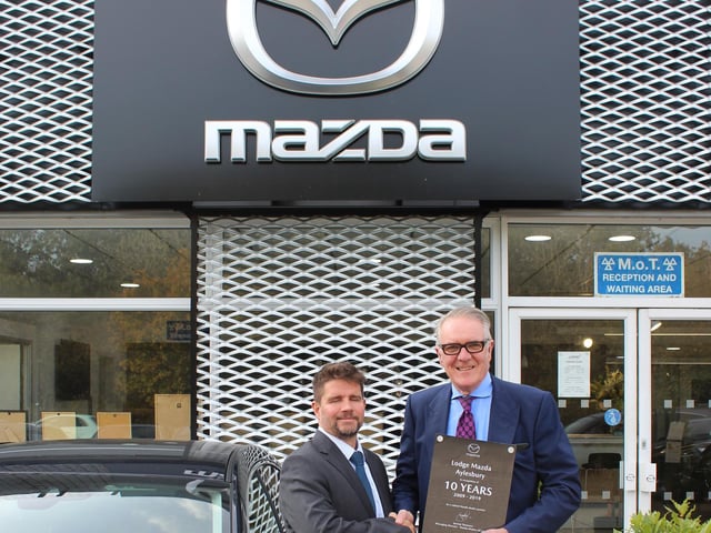 Pictured left Brett Hague Head of Network Development for Mazda and right Floyd Timms Managing Director Lodge Garage.