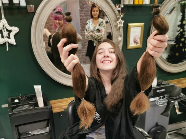 Katie shows off the hair she had cut