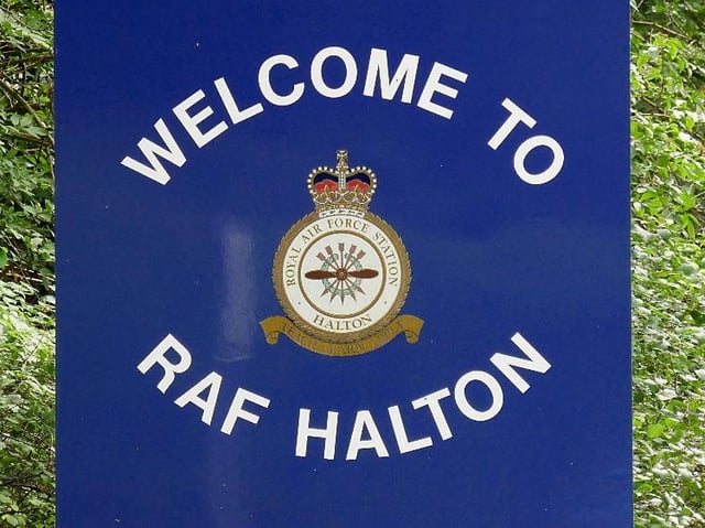 RAF Halton's welcome sign incorporates the five arrows of the Rothschild coat of arms as well as an aeroplane propeller.