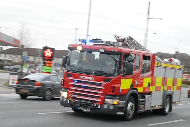 A Bucks Fire and Rescue service engine travelling in Aylesbury