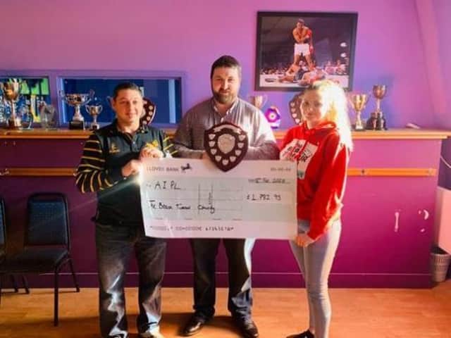 (from left to right) Aylesbury Invitational League Chairman Tony Festa, AIPL Internet/Social Media Officer James Connor and Rose Keene from The Brain Tumour Charity