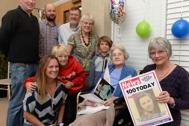 Joan celebrating her 100th birthday with her family yesterday