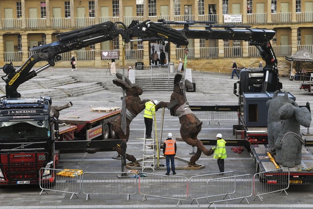 Instulation of a selection of sculptures by world renowned artist Sophie Ryder, on display in The Piece Hall, Halifax.