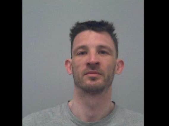 David Rowe, aged 34, is wanted on recall to prison for breaching licence conditions.