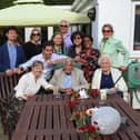 Earl Cameron on his 100th birthday with members of the Aylesbury Bah community