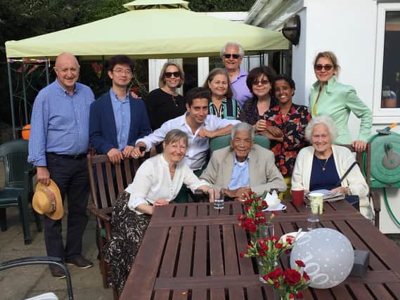 Earl Cameron on his 100th birthday with members of the Aylesbury Bah community