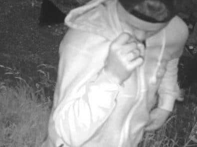 CCTV image of a person officers would like to speak to following a burglary in Wendover
