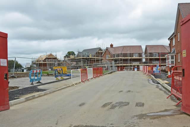 Entrance to Abbey's new 125-home development from Lower Road, Stoke Mandeville, which requires a new junction layout