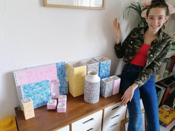 Ella Pearson, aged 13, has set up her own business selling decorating notebooks and vases