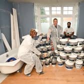 Young tradespeople at work on the property