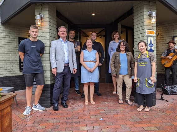 Steve Bowles, Chairman of the AGT Board and Cabinet Member for Town Centre Regeneration, with some of the owners of Cambridge Street businesses.