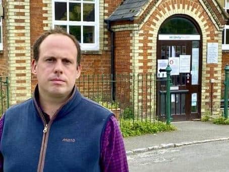 Buckingham MP Greg Smith stands outside the surgery