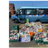 Bernie the Bus volunteers receive awards from the Prime Minister