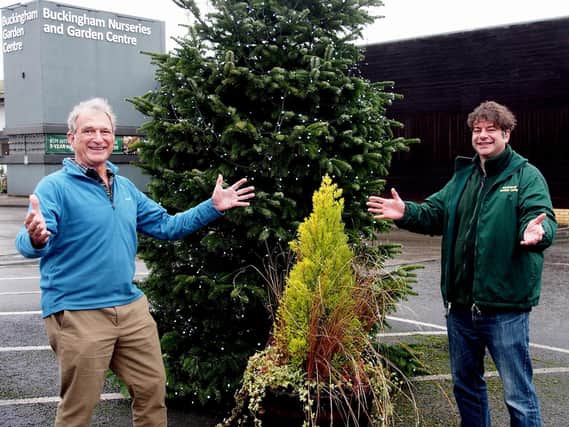 Geoffrey Furber, Founder, Ripple Africa together with Peter
Brown, one of the partners of Buckingham Garden Centre, celebrate this month’s
successful fundraising efforts under the Christmas tree.