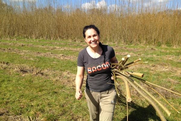 Candice Hunt collecting wood for the pen project