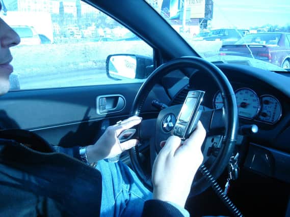 Thames Valley Police warn Aylesbury Drivers: stay off your phones while in a car!
