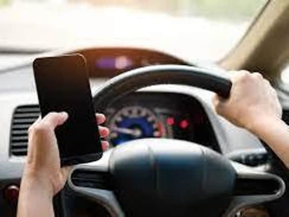 Please don't use your phone while driving!