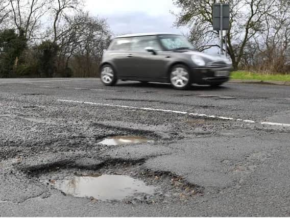 Funding to repair roads in Buckinghamshire cut by a quarter