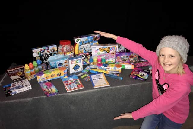 One of the happy recipients of a Kid's Big Box of Hope