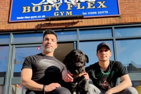 Tony with his son and Rocky the dog outside Body Flex gym