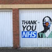 The stenciled graffiti has popped up on the garage of a house in Old Brewery Close in Aylesbury town centre.