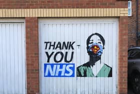 The stenciled graffiti has popped up on the garage of a house in Old Brewery Close in Aylesbury town centre.