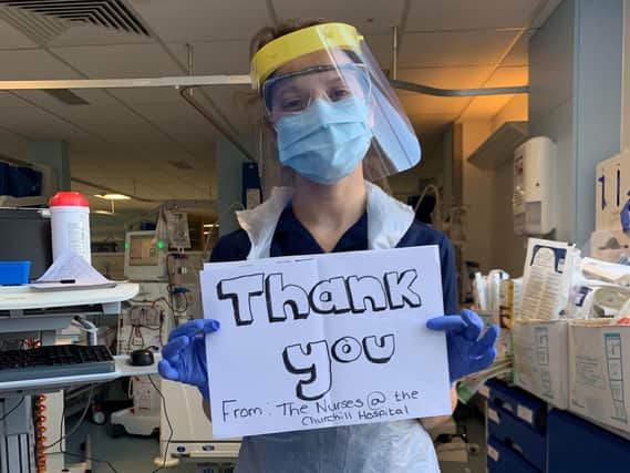 A nurse says thank you for the kind donations