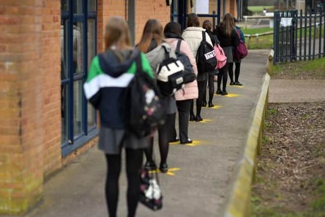 the crash caused a four-hour delay for anxious pupils