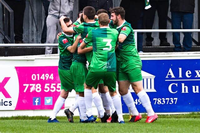 Goal celebrations for Aylesbury United after Ty Deacon scored in just 15 seconds (PICTURES BY MIKE SNELL)