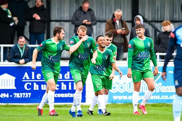Goal celebrations for Aylesbury United after Ty Deacon scored in just 15 seconds (PICTURES BY MIKE SNELL)