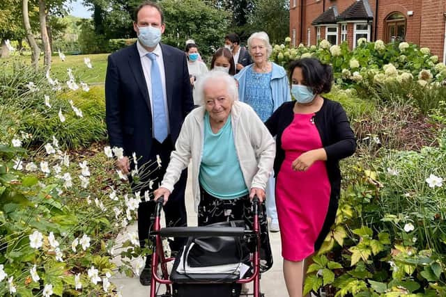 MP Greg Smith joins Hilda on her walk