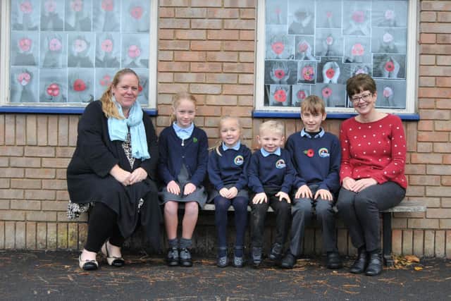 From left to right: Higher level teaching assistant Julie Hartshorn, Amelie Hankers, Molly Whitehead, Max Dewberry, Max Jowers, headteacher Cazz Colmer