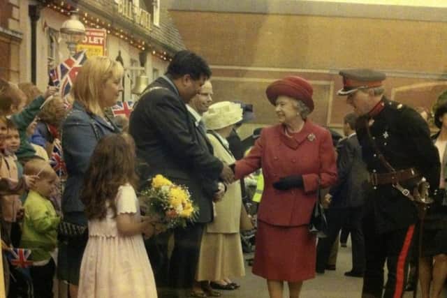 Mr khan pictured when he met the queen during his time as Aylesbury mayor