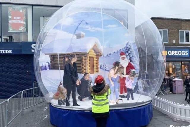 Have your picture taken in a giant snow globe