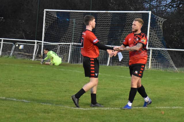 Aaron Berry celebrating his goal with Callum Shortt