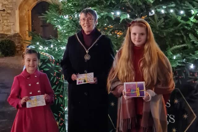 Competition winners Isabella Caswell and Eva Whittemore with Mayor of Buckingham Margaret Gateley