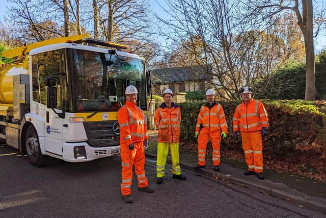 Steven Broadbent, pictured far left, Cabinet Member for Transport, with members of Transport for Bucks and one of the gulley cleaning trucks