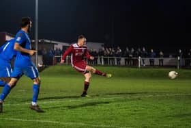 Marcus Mealing scoring Risborough Rangers’ 50th league goal of the season against Oxhey Jets in their 50th game unbeaten  (Picture by Charlie Carter)