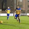Ezra Anthonio-Forde scoring Aylesbury United's consolation against Berkhamsted (Picture by Mike Snell)