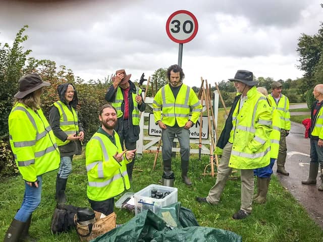 Verge seeding with volunteers in Weedon