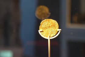 The gold Half Angel coin
