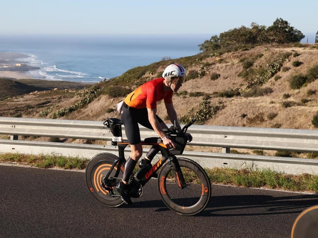 Jack gets on his bike for competition.