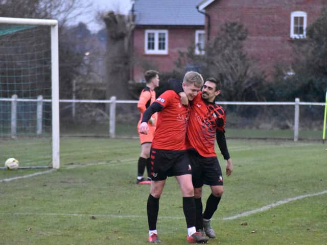 Scorer Jake Baldwin is congratulated by Chris Stapleton